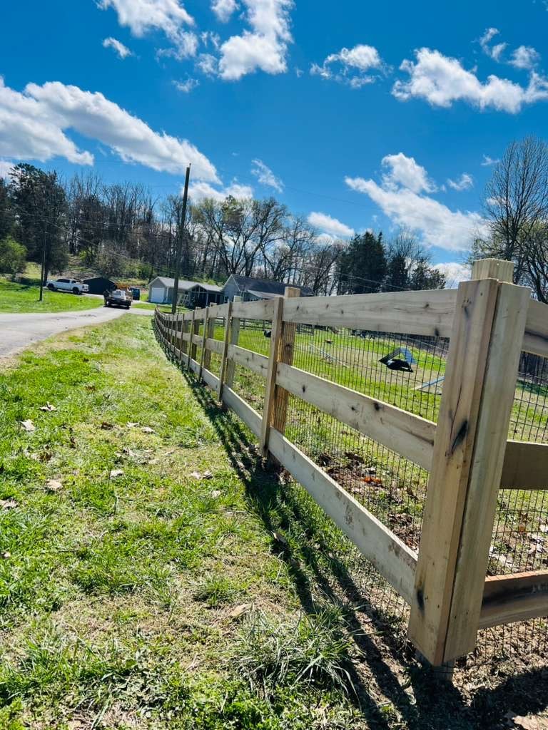 3 rail Kentucky board farm fence with hog wire — East Tennessee rural property
