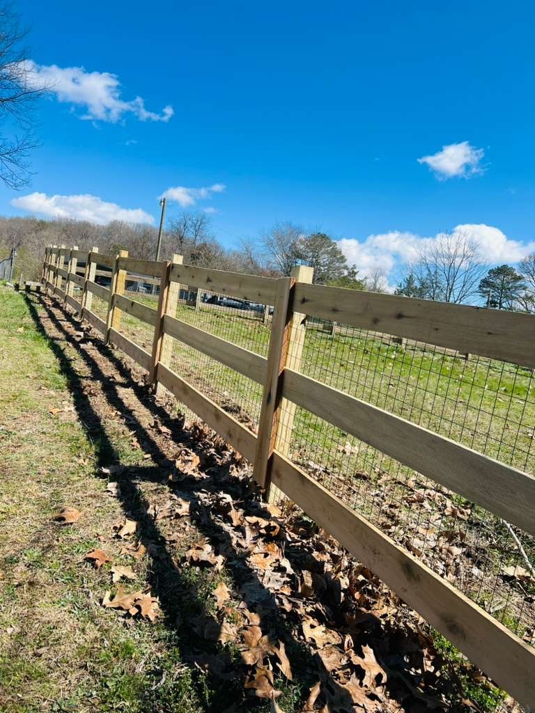 3 rail farm fence with hog wire panel backing — East Tennessee livestock fence