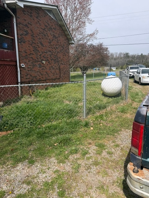 Chain link fence side yard at brick home — East Tennessee