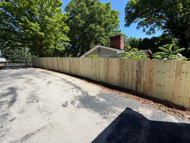 6 foot wood privacy fence completed installation — East Tennessee