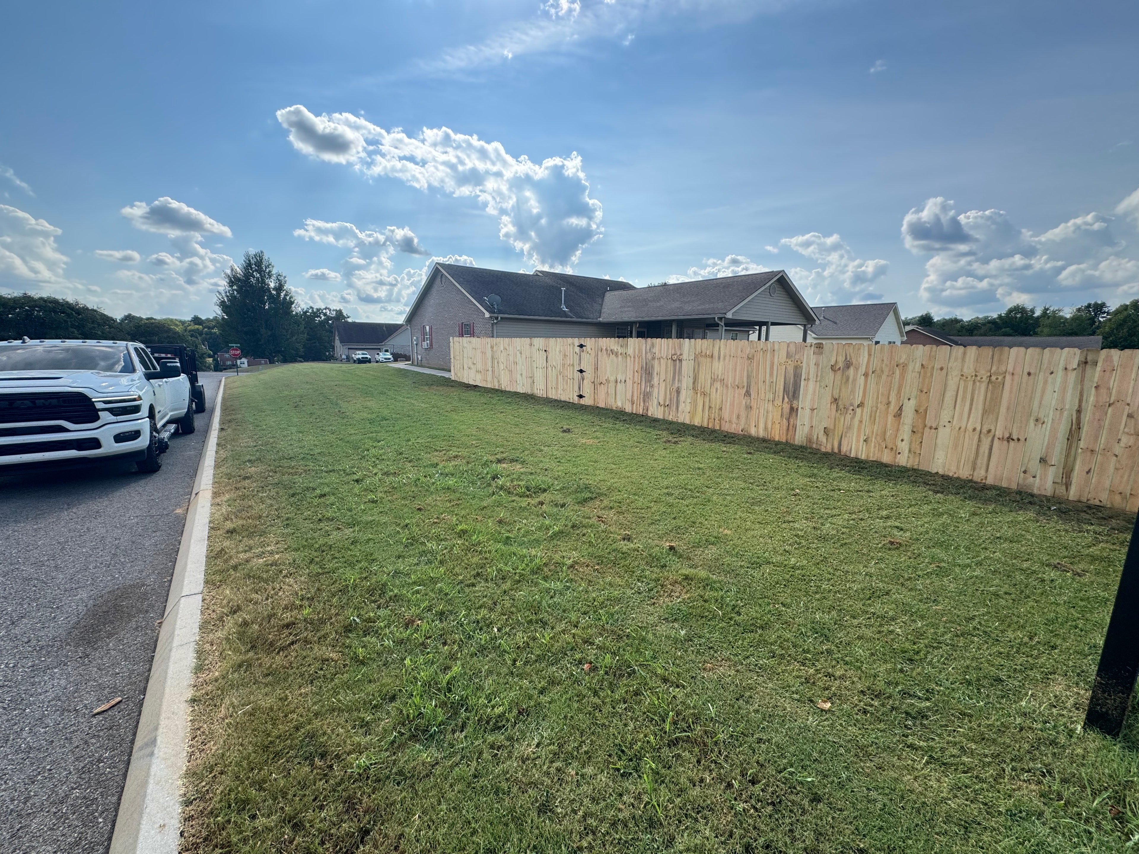 6 foot wood privacy fence along road frontage — East Tennessee