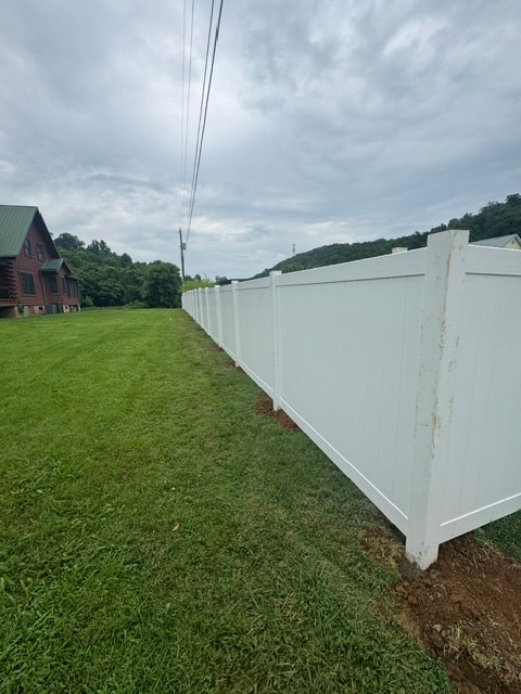 6 foot white vinyl privacy fence hillside property — East Tennessee